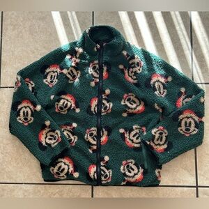 Mickey Mouse Santa wearing Sherpa green jacket